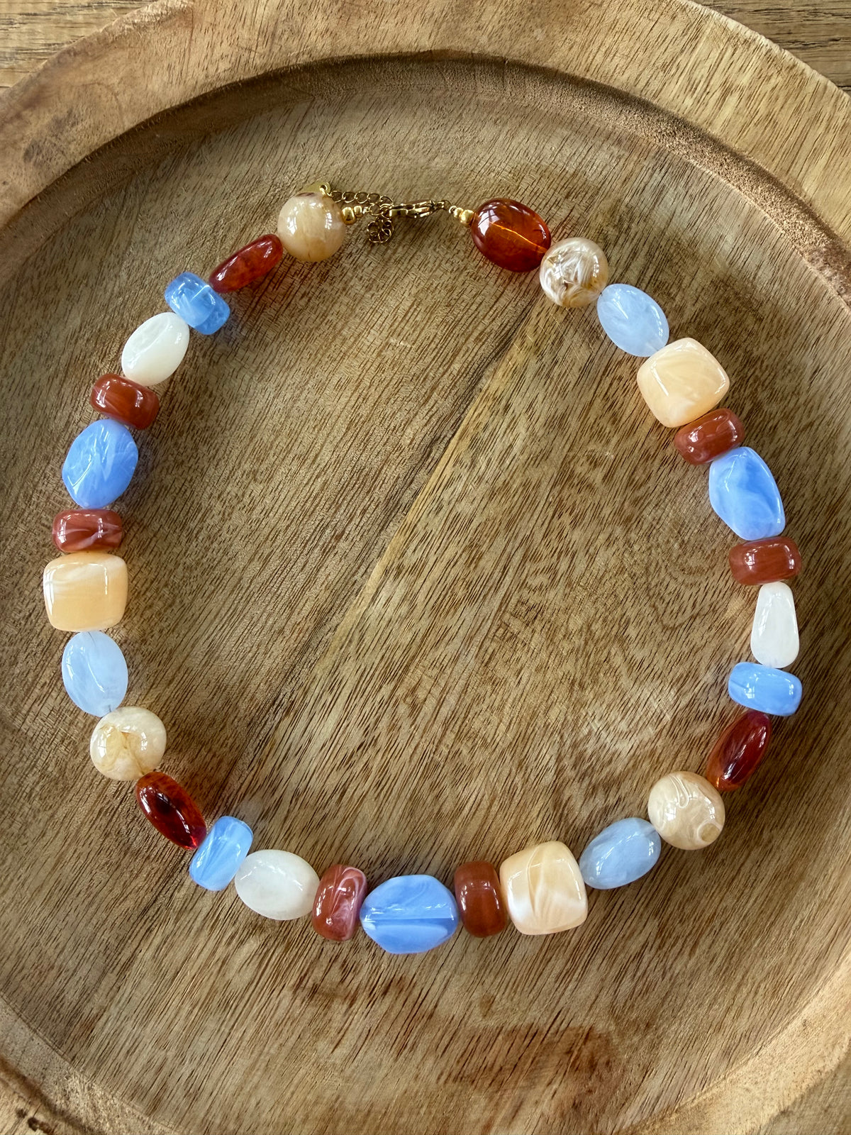 Blauw/ bruine acrylkralen ketting