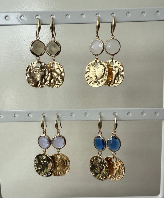 Doorzichtig paars facetsteentje met muntje