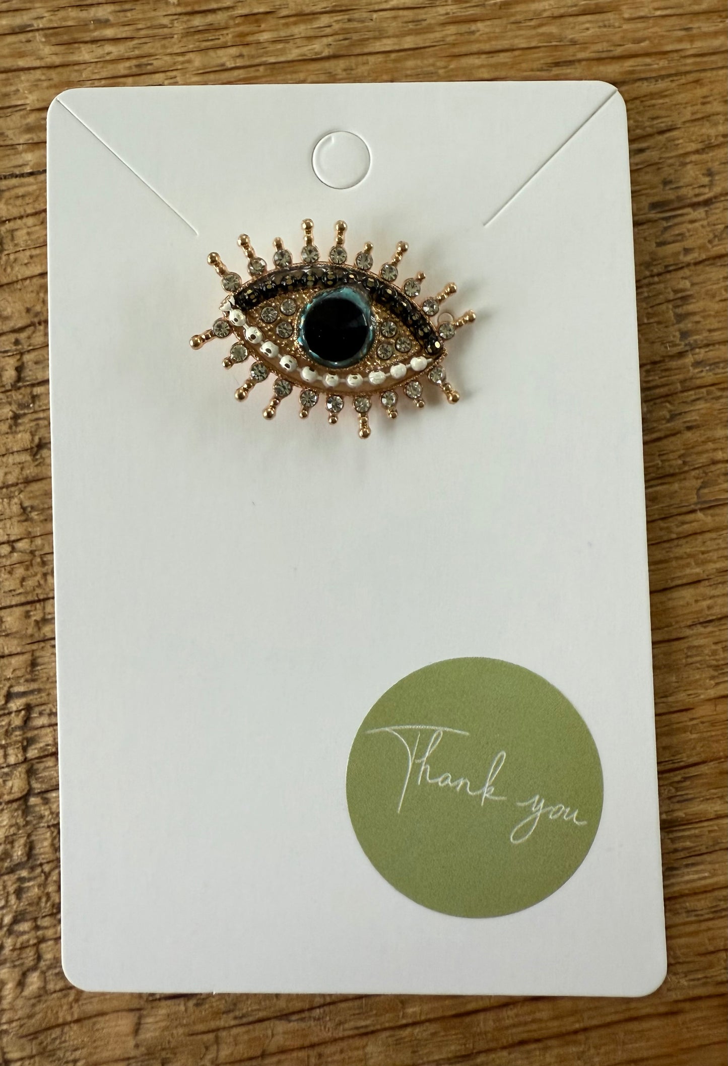 Broche oog