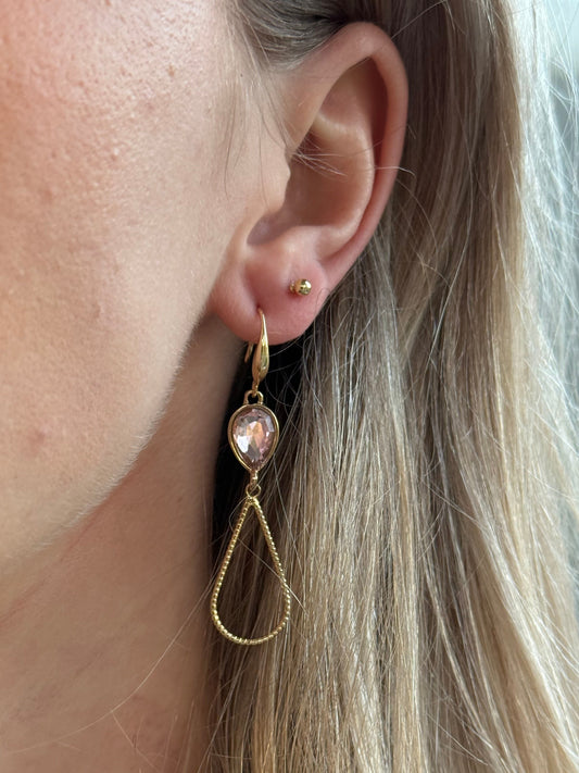 Licht roze steentje met open druppel