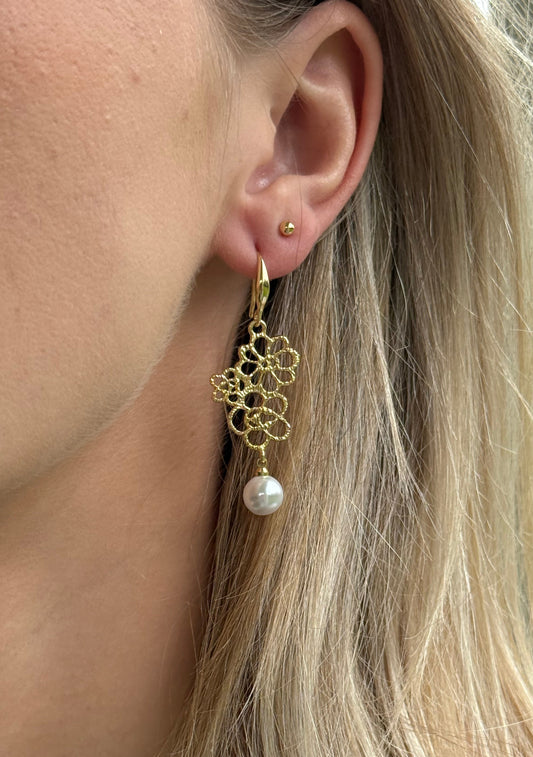 Rond pareltje aan luxe hanger