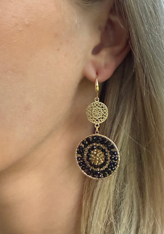 Zwart/goud kraaltjes aan dichte connector