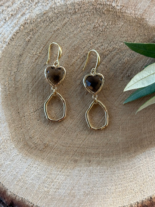 Doorzichtig bruin hartje met kleine hanger