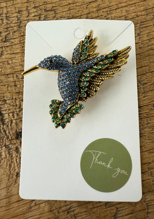 Broche blauwe kolibrie
