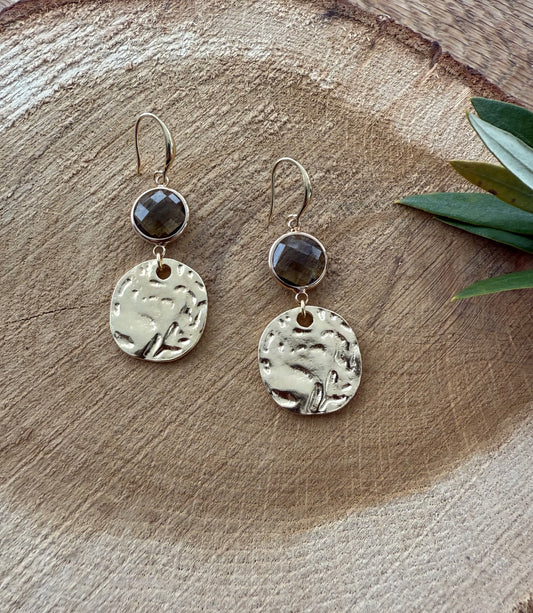 Doorzichtig bruin facetsteentje met muntje