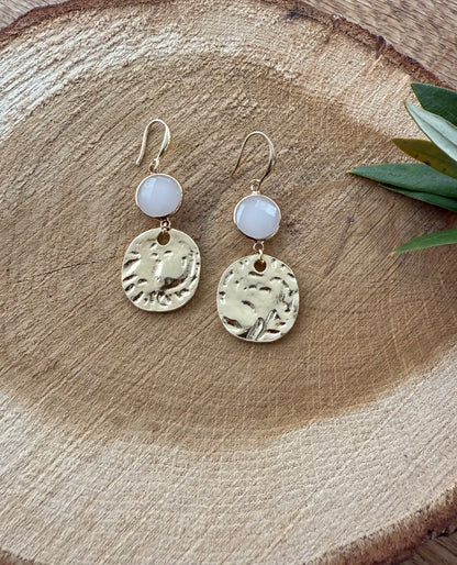 Wit facetsteentje met muntje