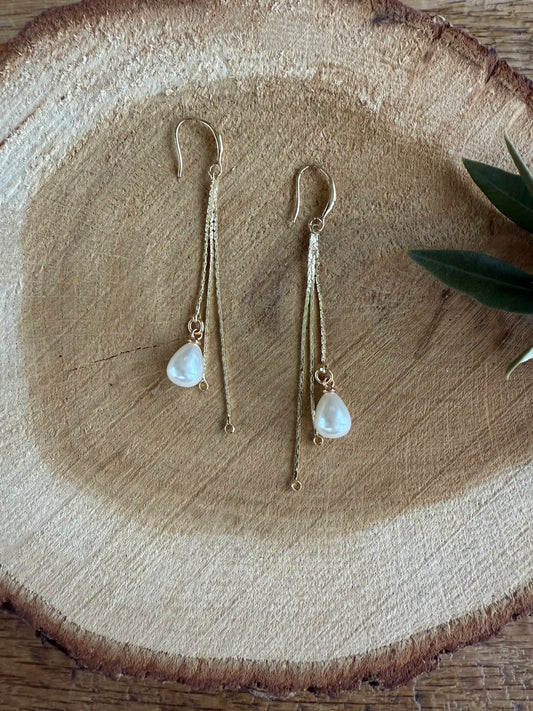 Lange oorbellen met pareltje