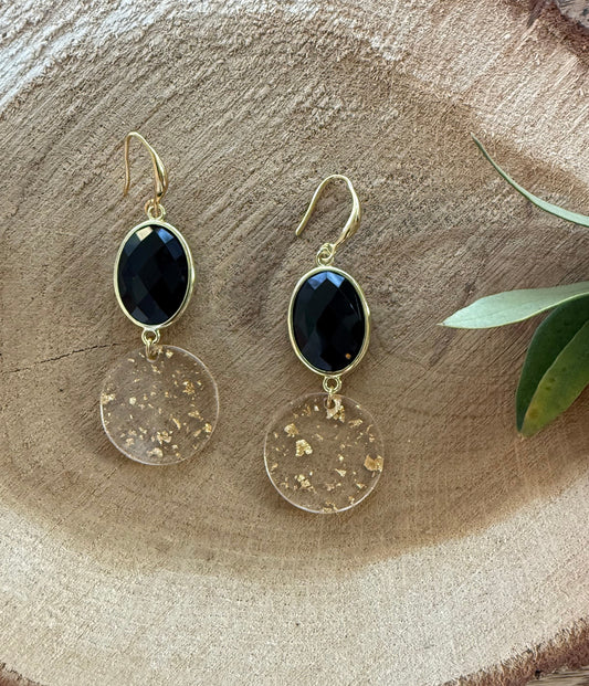 Zwarte steen met doorzichtige hanger met bladgoud