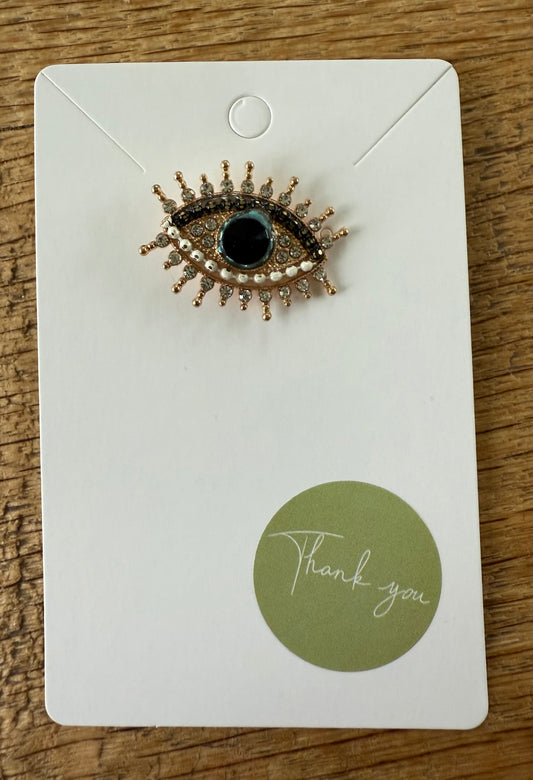 Broche oog