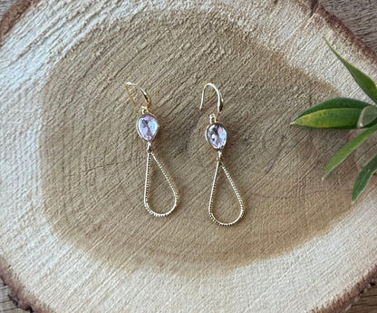 Licht roze steentje met open druppel