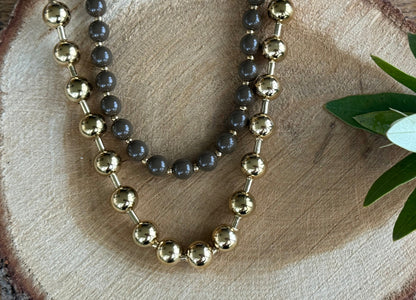 Dubbele ketting met bruine kralen