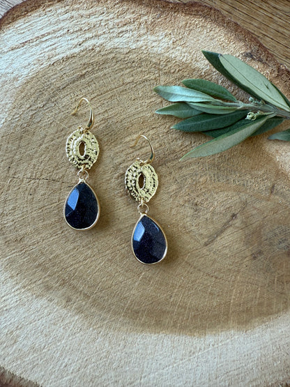 Donker blauwe natuursteen met glittertjes aan ovale connector