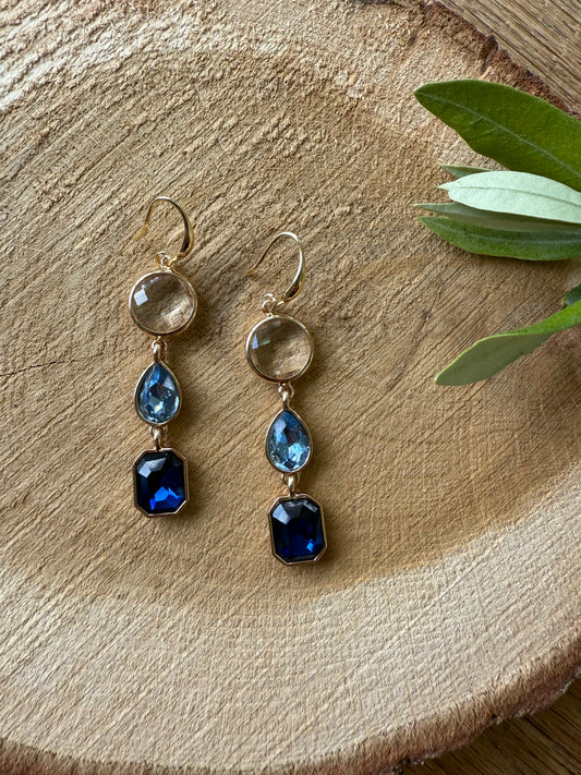 Doorzichtige steen met 2 blauwe stenen